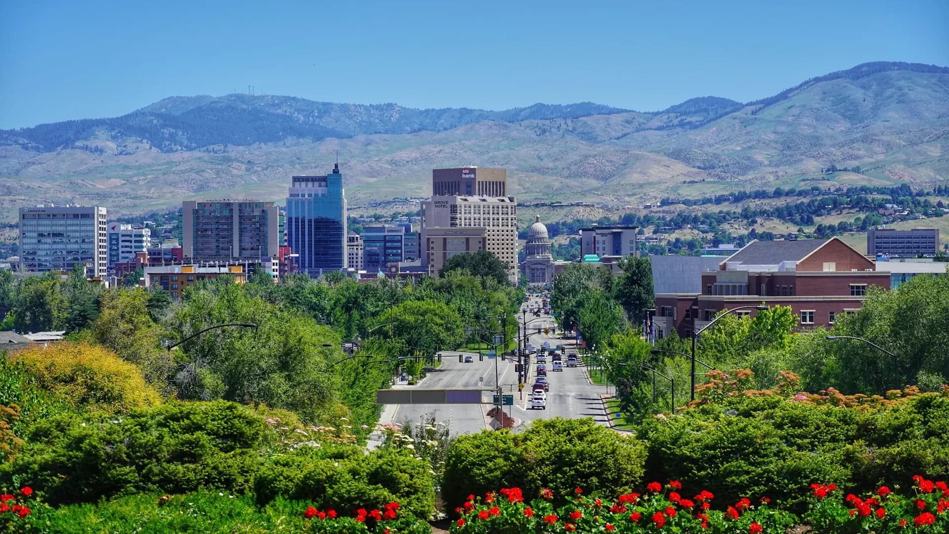 Downtown Boise and the foothills beneath a clear blue sky